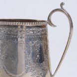 A Victorian silver cream jug, tapered ovoid form with engraved Adams style floral swag decoration