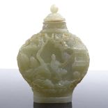 A Chinese relief carved green stone snuff bottle and stopper, height 6.5cm