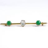 A Chinese 14ct gold 3-stone cabochon opal and green stone bar brooch, brooch length 57.3mm, 3.4g