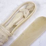 A Chinese ivory paper knife with relief carved handle in the form of a deity, length 30cm, and a