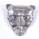 A modern handmade sterling silver and ruby panther-head pendant, pendant height 32.3mm, 7.3g Very