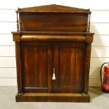 A 19th century rosewood chiffoniere, with raised shelved back, single frieze drawer and turned