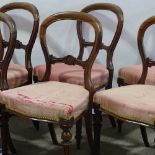 A set of 6 19th century rosewood balloon back dining chairs.