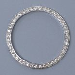 An unmarked white gold diamond set Rolex watch bezel, internal diameter 30.4mm, external diameter