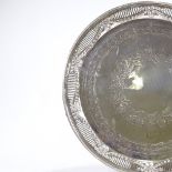 A large circular electroplate tray, with pierced and embossed surround, diameter 53cm