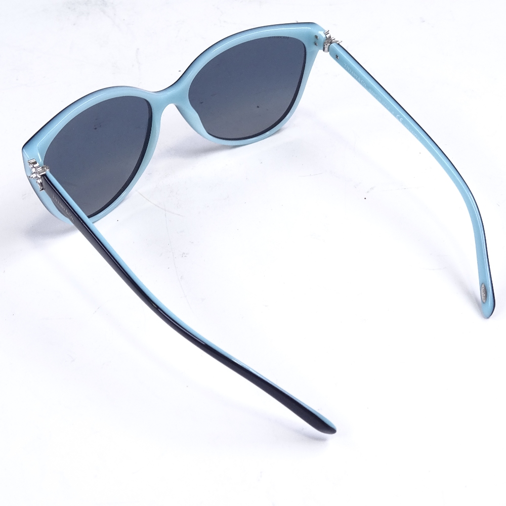 A pair of new Tiffany & Co black and blue framed sunglasses, leather-cased, RRP £335 - Image 3 of 3