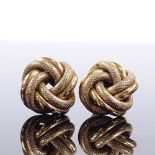 A pair of 9ct gold textured knot stud earrings, earring height 18.2mm, 3.8g Both in very good