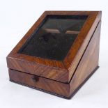 A glass fronted kingwood watch case, with drawer and blue velvet interior Good overall condition