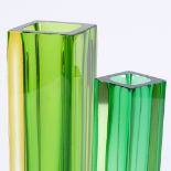 A graduated pair of Murano Sommerso square-section vases in green/orange, with clear casing,