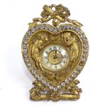 A Victorian gilt-metal heart-shaped clock in paste set surround, height 14cm