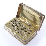 A William IV silver-gilt vinaigrette, rectangular form with relief engraved floral border and engine