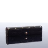 A small 19th century tortoiseshell and gold inlaid dome-top toothpick case, length 5.5cm Slight