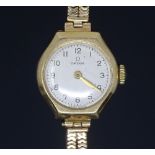 OMEGA - a lady's Vintage 9ct gold mechanical wristwatch, ref. 77757, silvered dial with painted