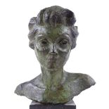 A verdigris patinated bronze bust of Dorothy Dickson (1893 - 1995), signed with a Greek lambda