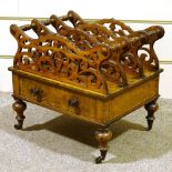 A Victorian figured walnut Canterbury, with pierced shaped divisions and drawer below, 51cm x 40cm