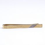 A late 20th century 9ct gold diamond tie clip, length 44.9mm, 3.1g Very good original condition,