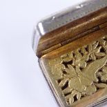 A George IV silver vinaigrette, bright-cut engraved lattice and floral decoration with gilt