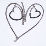 An Italian sterling silver cubic zirconia heart pendant, stylised form with internal hanging hearts,