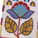 A Native American beadwork pouch/bag, probably mid-20th century, with leaf and flower design and