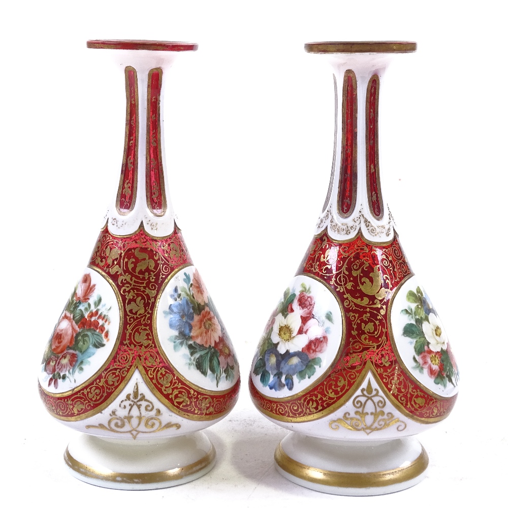 A pair of Bohemian ruby and milk overlay glass narrow-necked vases, with hand painted floral - Image 2 of 3