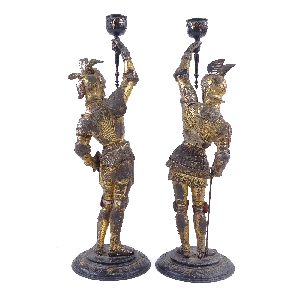 A pair of Victorian painted and gilded spelter candle holders, supported by knights in armour, - Image 3 of 3