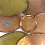 A group of Arts and Crafts copper and brass trays, including 4 pieces by Hugh Wallis and 2 trays