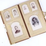 A Victorian felt-bound family photograph album, gilt-metal mounts and mostly full, album length 35cm