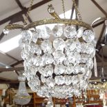 A gilt-metal hanging light fitting, with cut-glass lustre drops