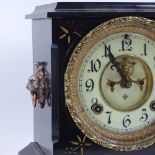 A late 20th century Ansonia Clock Co black painted cast-iron 8-day mantel clock, enamel dial with