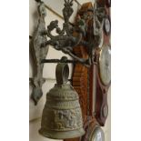 A cast-brass bell on bracket