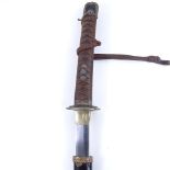A Second War Period Japanese Officer's katana sword, in black lacquered scabbard, blade length 65cm