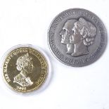 A 2008 gold plated silver Tristan Da Cunha proof £5 coin, and a John Pinches silver commemorative