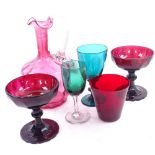 A Victorian cranberry glass ewer (no stopper), and 5 other pieces of coloured glass (6)