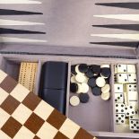 A Harrods Games Compendium, complete with games board, dominos and backgammon, case length 42cm