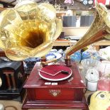 A reproduction Victrola twin brass-horn gramophone, base width 45cm