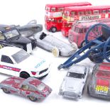 Various die cast toy vehicles, including military and racing