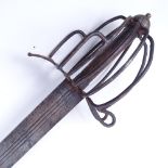 A Scottish? basket-hilt broadsword, iron cage basket-hilt, with emblem engraved blade, blade