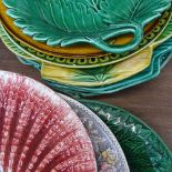 Various Wedgwood Majolica plates, including shell and leaf