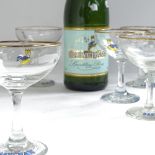 A bottle of Babycham and 6 Babycham glasses