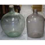 A green glass carboy, and a glass flagon