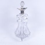 An Edwardian glass decanter with silver collar