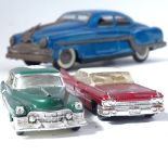 A Vintage tinplate push-along American car, L25cm, and 2 other diecast cars (3)