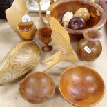 A collection of treen items, including apples, a duck, height 29.5cm, a carved bird and bowls etc