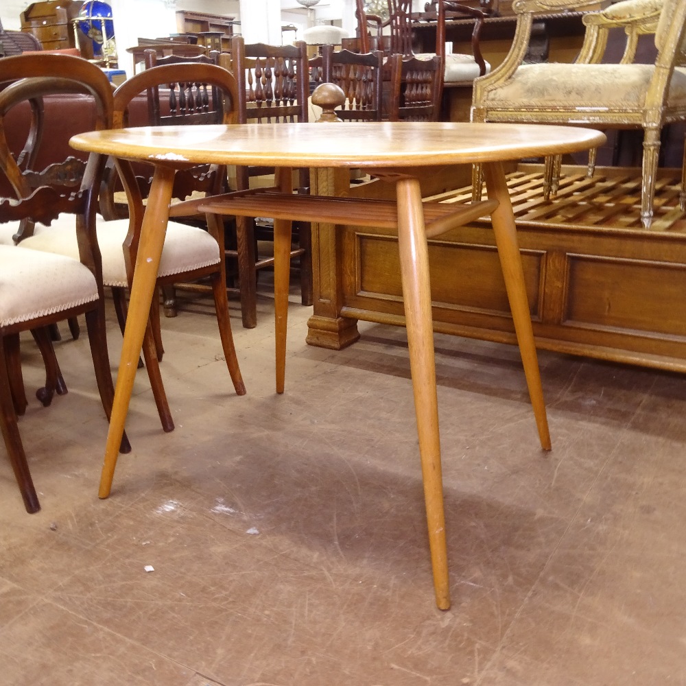 An Ercol elm and beech oval kitchen table on turned legs, W100cm, H73cm - Image 2 of 3