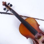 An early/mid-20th century Stradivarius copy violin and bow, in hardshell case, violin length 60cm