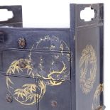 A Japanese gilded and lacquered kodansu cabinet, Meiji Period, fitted with 2 long and 2 short