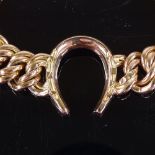 A Victorian unmarked rose gold double curb link horseshoe bracelet, tests as 14ct gold, bracelet