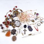 A box of various jewellery, including 9ct gold buckle ring, yellow metal bead necklaces, silver