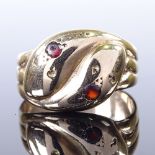 A late 19th/early 20th century 9ct gold garnet double snake-head ring, setting height 13.2mm, size