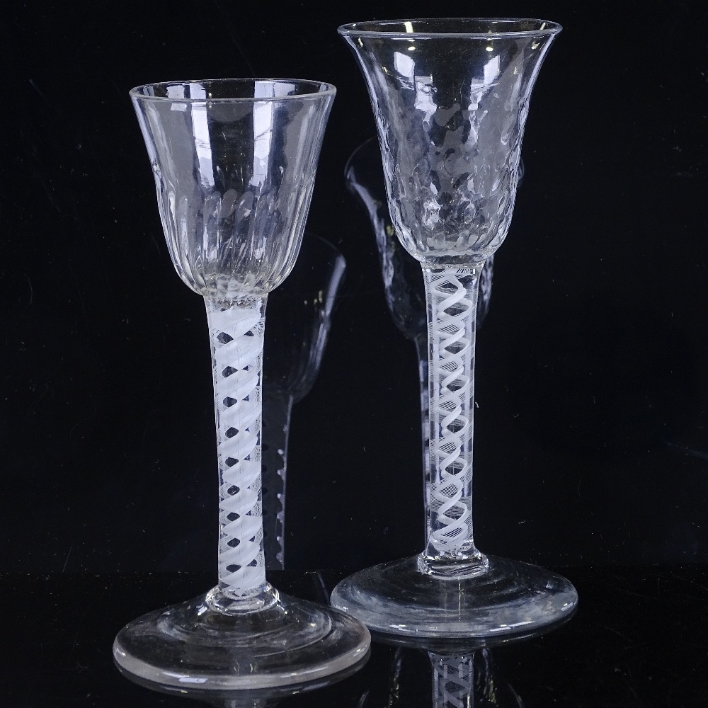 2 18th century cordial glasses with milk twist stems, height 16cm and 15cm Both perfect